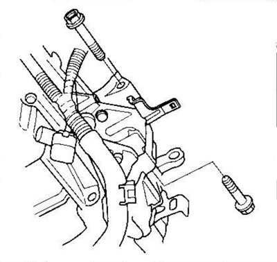 28. Remove the two lower mounting bolts from the…