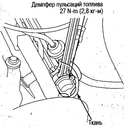 3. Place the cloth over the fuel pulsation damper.